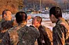 Jin, second from right, who was selected to serve as an assistant instructor, is seen after having gone through Army CBRN (chemical, biological, radiological and nuclear) training in a photo released by the training center on January 13, 2023. [YONHAP]