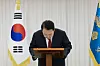 President Yoon Suk Yeol bows his ahead as he gives a public address at his residence in Hannam-dong, central Seoul, Saturday, after the National Assembly passed an impeachment motion against him. [PRESIDENTIAL OFFICE]