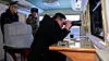 North Korean leader Kim Jong-un is seen overseeing the launch of a new surface-to-air missile on Dec. 24. [KOREAN CENTRAL NEWS AGENCY]