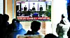 People watch a live broadcast of the verdict for former first lady Kim Keon Hee at Seoul Station on the afternoon of Jan. 28. [NEWS1]