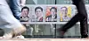 Posters for presidential candidates are seen plastered on a wall in Yeoksam-dong, Gangnam District, southern Seoul on May 29. [NEWS1]