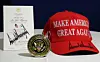 Gifts from U.S. President Donald Trump to Korean President Lee Jae Myung during their summit in Washington on Aug. 25 include a commemorative White House medal, a MAGA hat bearing Trump’s signature and a signed luncheon menu. [JOINT PRESS CORPS]