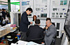 Korean company officials and foreign buyers meet at a booth during the World Korean Business Convention held at Jeonbuk National University in Jeonju, North Jeolla, on Tuesday. [YONHAP]