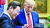 President Lee Jae Myung presents U.S. President Donald Trump with the fountain pen he used to sign the guestbook during the Korea-U.S. summit at the White House in Washington on Aug. 25, 2025. [JOINT PRESS CORPS]