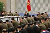 Kim Jong-un, center, speaks during the eighth enlarged meeting of the eighth Central Military Commission of the Workers’ Party at the party headquarters on May 28. [KOREAN CENTRAL NEWS AGENCY]