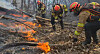 Firefighters work to contain a wildfire in Gyeongju, North Gyeongsang, on Feb. 8. [GYEONGBUK FIRE SERVICE HEADQUARTERS]