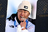 Silver medallist Kim Sang-kyum celebrates on the podium after the Men's Parallel Giant Slalom in Livigno, Italy, Feb. 8. [REUTERS/YONHAP]