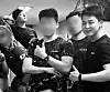 BTS members Jungkook and Jimin are seen in a group photo with their fellow soldiers uploaded online in October 2024. [SCREEN CAPTURE]