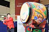 Theborn Korea CEO Paik Jong-won hits a drum during a ceremony for the listing of the company on the Kospi in Yeouido, western Seoul, on Wednesday. [YONHAP]