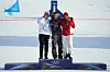 From left, silver medalist Kim Sang-kyum, gold medalist Austria's Benjamin Karl and bronze medalist Bulgaria's Tervel Zamfirov bite their medals after the men's snowboarding parallel giant slalom finals at the 2026 Winter Olympics, in Livigno, Italy, Feb. 8. [AP/YONHAP]