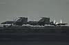Fighter jets are seen on the flight deck of China's first domestically built aircraft carrier Shandong as it sits anchored after arriving in Hong Kong on July 3. Commissioned in 2019, the 305-meter-long (1,000 feet) Shandong is China's second carrier and key to the country's regional ambitions under President Xi Jinping, who oversaw a massive naval buildup that has rattled Asian neighbors. [AFP/YONHAP]