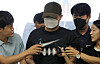 A man in his 20s accused of murdering his ex-girlfriend in Daejeon enters the Daejeon Seobu Police Station on Aug. 5. [YONHAP]
