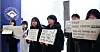 Members of the University Student Council network hold signs opposing tuition increases at Westin Josun Seoul on Jan. 22, when a Korean Council for University Education meeting was held. [NEWS1]
