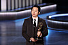 Actor Steven Yeun accepts the Outstanding Lead Actor in a Limited or Anthology Series or Movie award for ″Beef″ at the 75th Primetime Emmy Awards in Los Angeles, California, on Tuesday. [REUTERS/YONHAP]