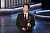 Actor Steven Yeun accepts the Outstanding Lead Actor in a Limited or Anthology Series or Movie award for ″Beef″ at the 75th Primetime Emmy Awards in Los Angeles, California, on Tuesday. [REUTERS/YONHAP]
