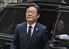 Lee Jae-myung arrives at the Seoul Central District Court in Seocho District, southern Seoul, on March 25 to testify in the trial of the Daejang-dong development scandal. [YONHAP]
