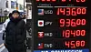 Exchange rates are seen displayed on an electric board outside a currency exchange in Myeongdong, Jung District, central Seoul, on Jan. 28. [NEWS1]