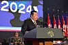 North Korean leader Kim Jong-un delivers a speech at the opening ceremony of an arms exhibition titled ″National Defense Development-2024,″ in Pyongyang on Thursday. [KOREAN CENTRAL NEWS AGENCY]