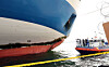 Officials from the Korean Register, the National Forensic Service and the Mokpo Coast Guard conduct a joint forensic inspection of the hull of the Queen Jenuvia II at Samhak pier in Mokpo, South Jeolla after the ship ran aground off Shinan County, South Jeolla, on Nov. 20. [NEWS1]