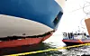 Officials from the Korean Register, the National Forensic Service and the Mokpo Coast Guard conduct a joint forensic inspection of the hull of the Queen Jenuvia II at Samhak pier in Mokpo, South Jeolla after the ship ran aground off Shinan County, South Jeolla, on Nov. 20. [NEWS1]