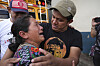 Edwin Osorio Lopez, right, embraces his mother Maria Cristina Lopez after being deported from the United States, outside La Aurora International Airport, in Guatemala City, on Aug. 31. [AP/YONHAP]