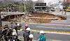Access to an intersection in Gangdong District, eastern Seoul, remains restricted on March 25 after a sinkhole swallowed a motorcyclist the previous day. The 34-year-old rider was found dead after a 17-hour search. [NEWS1]
