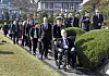 Sgt. Donald Northey's son Michael Northey, first from right, is accompanied out from Tuesday's rededication ceremony at the United Nations Memorial Cemetery in Busan by Brig. Gen. Andy Lamb, the British defense attache in Korea, and British Ambassador to Korea Colin Crooks, second and third from right. [PARK SANG-MOON]