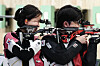 Korea's Park Ha-jun and Lee Eun-seo take bronze in the 10 meter air rifle mixed team event at the 19th Asian Games on Monday. [NEWS1]