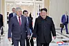 North Korean leader Kim Jong-un, right, and Russian Security Council Secretary Sergei Shoigu walk side by side in this image published by the Korean Central News Agency on June 18. [YONHAP]