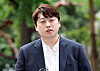 Park Dan speaks to reporters on his way to the police agency for a questioning session in western Seoul in August 2024. [NEWS1]