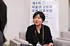 Muzhi Zhou, an assistant professor in the urban governance and design thrust at the Hong Kong University of Science and Technology Guangzhou, speaks during an interview with the Korea JoongAng Daily held on the sidelines of the 8th Global Symposium on Low Fertility and Ageing co-hosted by Statistics Korea and the United Nations Population Fund in central Seoul on Tuesday. [STATISTICS KOREA]