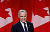 Former Bank of Canada and Bank of England governor Mark Carney smiles as he speaks after winning the race to become leader of Canada's ruling Liberal Party and will succeed Justin Trudeau as Prime Minister, in Ottawa, Ontario, Canada, on March 9. [REUTERS/YONHAP]