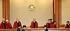 Presiding justices of the Constitutional Court take their seats during a court session on Dec. 1, 2025. [NEWS1]