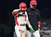 Kia Tigers infielder Kim Do-young, left, walks off during the KBO game against the Kiwoom Heroes at Gwangju-Kia Champions Field in Gwangju on May 27. [YONHAP]