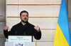 Ukrainian President Volodymyr Zelensky delivers a speech during a joint press conference with France's President Emmanuel Macron, unseen, at the Elysee Palace in Paris on Dec. 1. [AP/YONHAP]