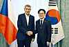 Andrej Babis, the newly appointed prime minister of the Czech Republic, left, shakes hands with Kim Jung-kwan, the Korean minister of trade, industry and resources, during a meeting in Prague on Feb. 16. [YONHAP]