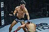 Korea's Ok Rae-yoon, left, faces Eddie Alvarez in April 2021. [ONE CHAMPIONSHIP]