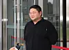 Lee Jun-hee, known by his YouTube alias GooJeYeok, arrives at the Suwon District Prosecutors Office in Suwon, Gyeonggi, on July 26, 2024, to attend a court hearing to review a warrant for his arrest. [NEWS1]