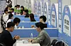 Participants of a job fair held at Busan Exhibition Convention Center in Busan meet with representatives and recruiters from major companies in Korea on Nov. 20, 2024. [JOONGANG ILBO]
