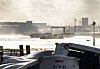 Emergency response vehicles are seen nearby an upside down Delta Air Lines plane, which was heading from Minneapolis to Toronto when it crashed on the runway at Pearson International Airport, in Toronto, Monday, Feb. 17. [AP/YONHAP]