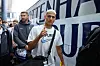 Richarlson flashes the camera a thumbs up as he prepares to board the team bus. [COUPANG PLAY]