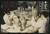 The National Museum of Korea's conservators restore ceramics at the museum's conservation room in the 1980s. [NATIONAL MUSEUM OF KOREA]