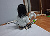 A 6-year-old girl sits in front of a mini fan after playing with water to fall asleep on a sweltering night. Her mother says she still wakes up at night complaining about the heat. [JOONGANG ILBO]