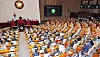 A bill amending the Korea Educational Broadcasting System Act passes in an 189-0 vote at the National Assembly in Yeouido, western Seoul, on Tuesday. The seats of conservative People Power Party members on the right are empty after they walked out from the chamber in protest. [YONHAP]
