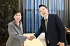 President Yoon Suk Yeol, right, shakes hands with former President Park Geun-hye, in Daegu on April 12, 2022. [YONHAP]