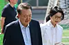 Former President Yoon Suk-yeol and his wife Kim Keon Hee arrive at the polling station at Wonmyong Elementary School in Seocho District, southern Seoul, on Tuesday morning to cast their ballots in the 21st presidential election. [JOINT PRESS CORPS]