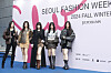 Girl group NewJeans poses on the blue carpet before Julycolumn's opening show for Seoul Fashion Week 2024 Fall/Winter at the Dongdaemun Design Plaza in central Seoul on Thursday. [NEWS1]
