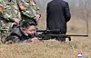 North Korean leader Kim Jong-un personally test-fires a newly developed sniper rifle during a visit to the country's special forces on April 4, the day when South Korea’s Constitutional Court delivered its ruling to uphold Yoon's impeachment. [YONHAP]
