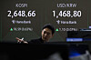 A screen in Hana Bank's trading room in central Seoul shows the Kospi opening on March 25. [YONHAP]