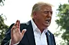 U.S. President Donald Trump speaks to the press before boarding Marine One on the South Lawn of the White House in Washington on July 11. Trump on July 12 said major U.S. trading partners Mexico and the European Union would face a 30 percent tariff starting next month, ramping up pressure for deals in his trade wars. [AFP/YONHAP]
